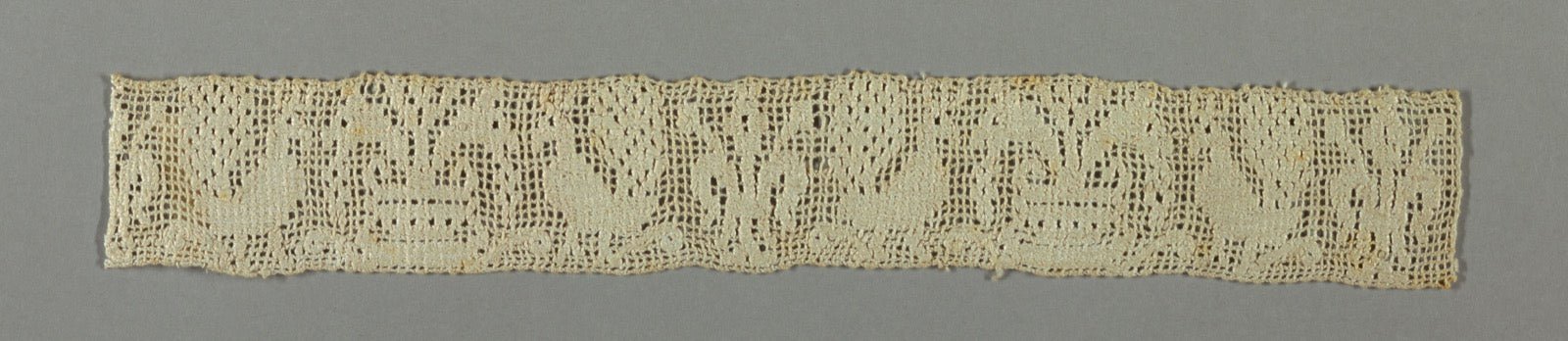 Seventeenth-century Italian gauze band with fine hexagonal openwork mesh.