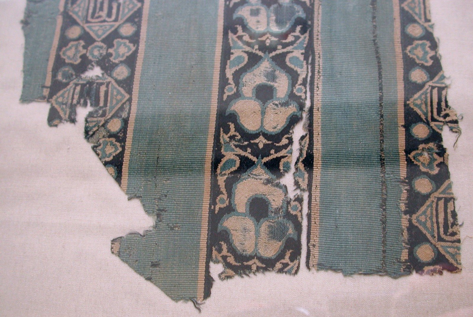 Fourteenth-century silk double-weave textile fragment from the Metropolitan Museum.