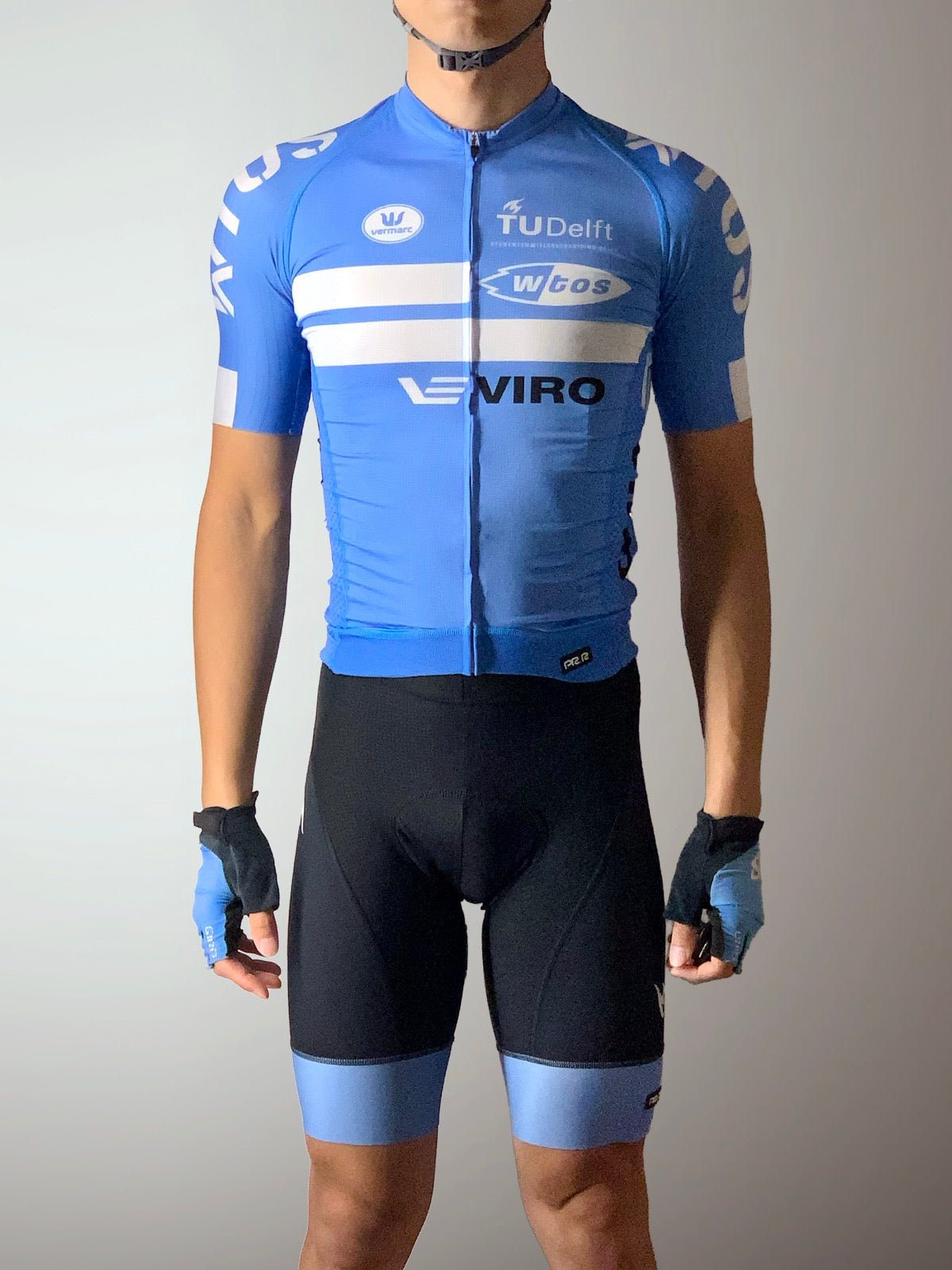 Cyclist in tight stretch jersey and bib shorts that rely on elastane.