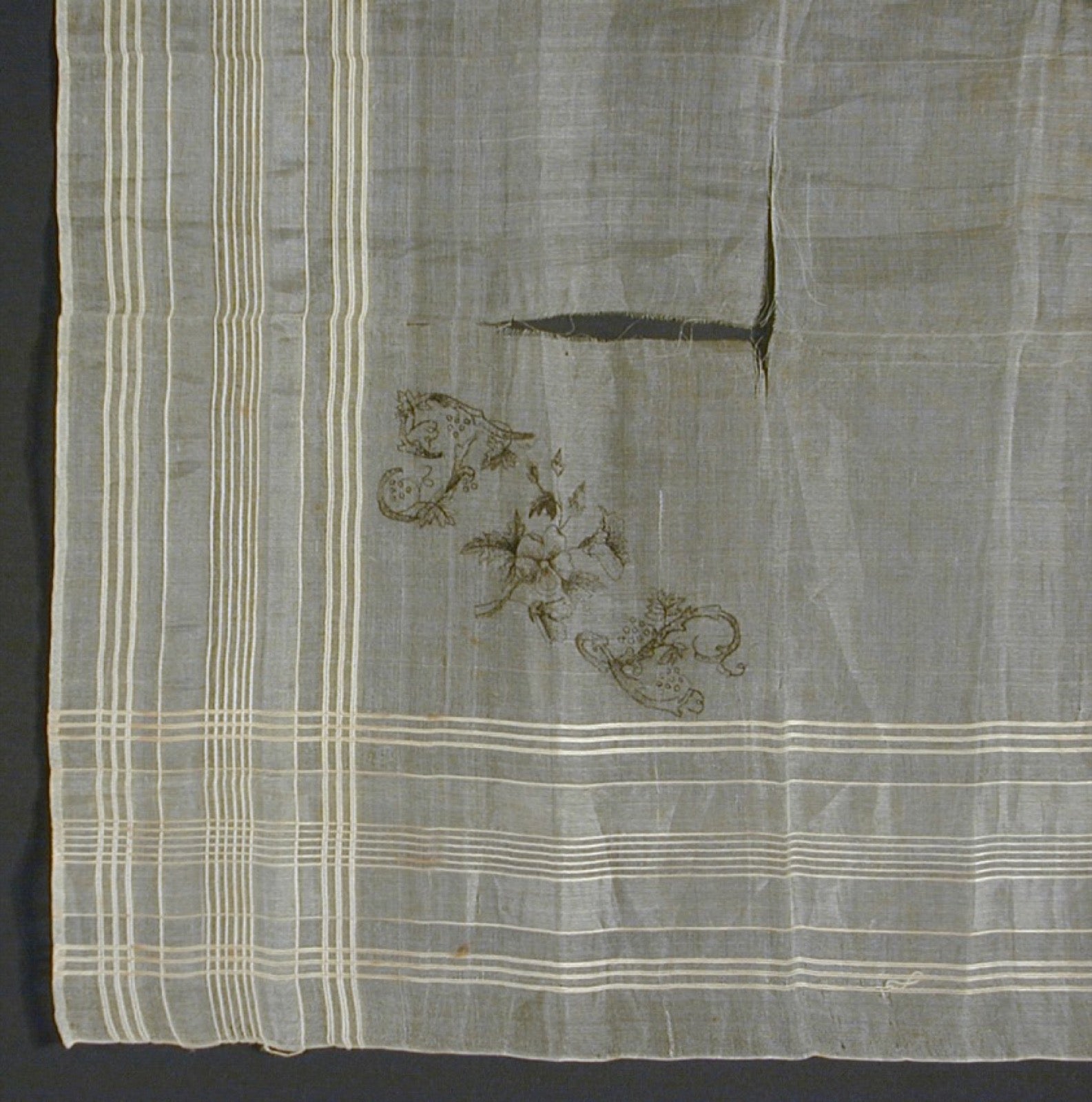 Reverse side of fine dimity handkerchief showing delicate rib structure.